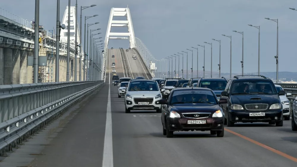 FILE - Cars and other vehicles drive on the Kerch&nbsp;Bridge connecting the Russian mainland and the Crimean&nbsp;Peninsula on&nbsp;Thursday, Feb. 23, 2023. &nbsp;(AP Photo, File)