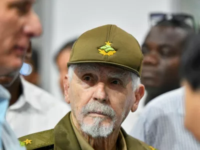 FILE PHOTO: Commander of the Revolution and Cuba's former Vice President Ramiro Valdes looks at Cuba's President Miguel Diaz-Canel during a visit to the 3rd International Exhibition of Renewable Energy and Energy Efficiency, in Havana, Cuba September 20, 2024. REUTERS/Norlys Perez/File Photo