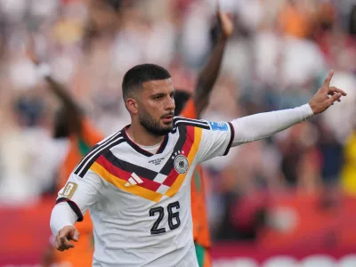 Germany's Deniz Undav celebrates after scoring their second goal during the World Cup Group E soccer match between Germany and Ivory Coast in Toronto, Saturday, June 20, 2026. (AP Photo/Stephanie Scarbrough)