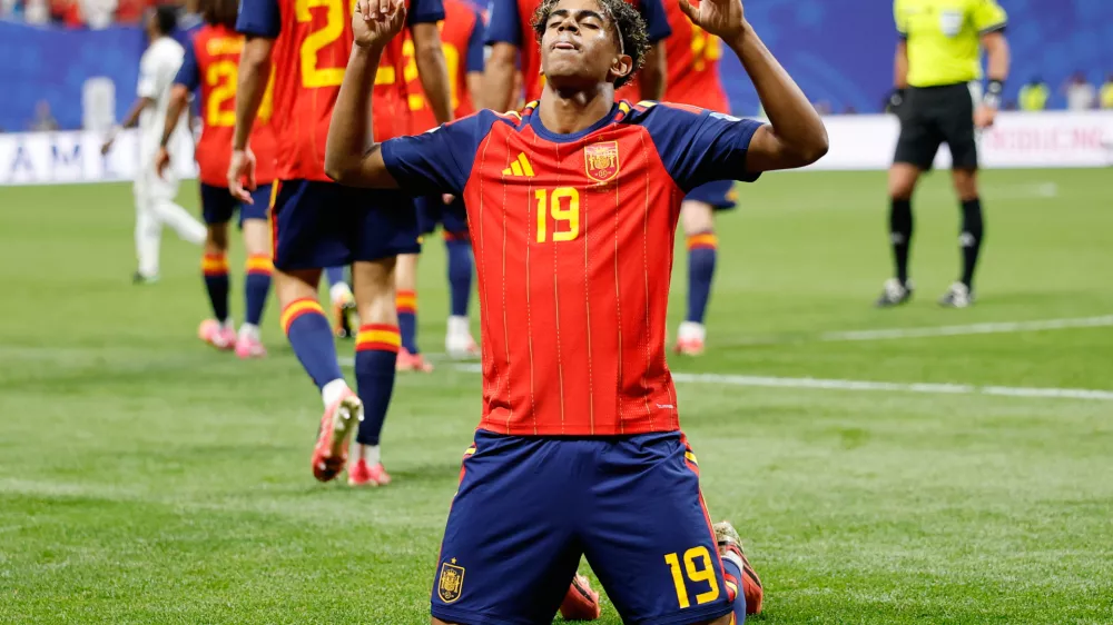 Spain's Lamine Yamal celebrates after scoring his side's opening goal during the World Cup Group H soccer match between Spain and Saudi Arabia in Atlanta, Sunday, June 21, 2026. (AP Photo/Erik S.Lesser)