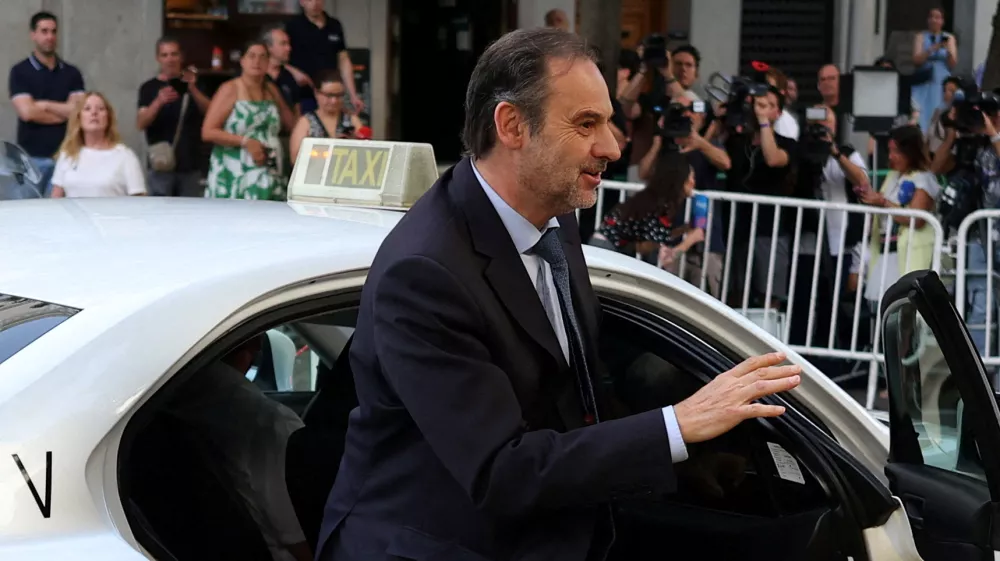 FILE PHOTO: Former Spanish Transport Minister Jose Luis Abalos arrives to testify before a Supreme Court investigating judge in an alleged corruption case affecting the ruling Socialist Party in Madrid, Spain, June 23, 2025. REUTERS/Pedro Nunes/File Photo