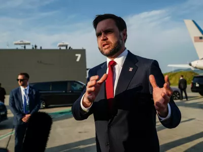 U.S. Vice President JD Vance speaks to members of the media before boarding Air Force Two, after the U.S. and Iran held high-level talks at the Lake Lucerne Summit, at Emmen Military Air Base, Emmen, Switzerland, June 22, 2026. REUTERS/Nathan Howard/Pool