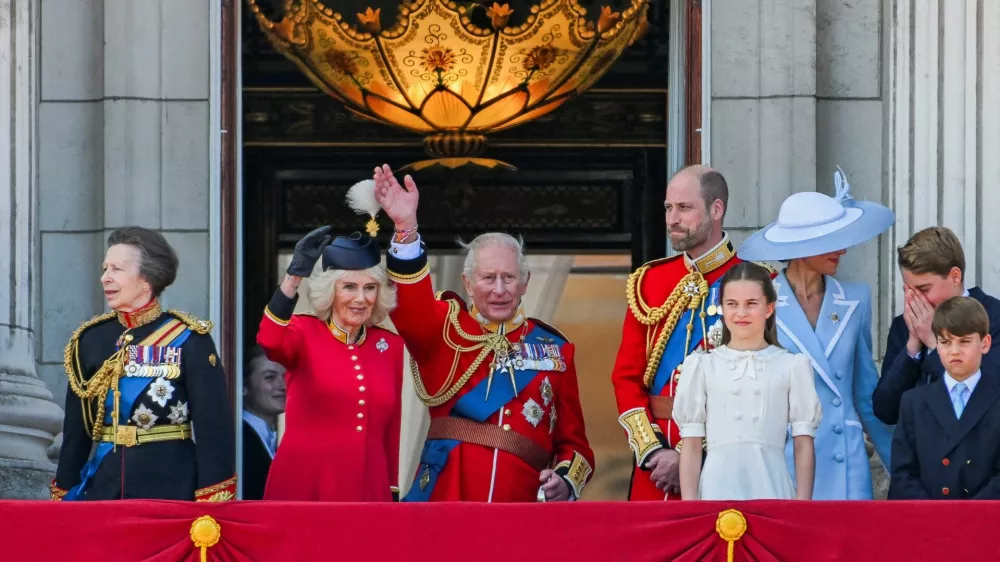 FILE PHOTO: Britain's King Charles, Queen Camilla, Prince William, Kate, Princess of Wales, Prince George, Princess Charlotte, Prince Louis, Anne, Princess Royal, and other officials appear on the balcony of Buckingham Palace during the Trooping the Colour parade to honour Britain's King Charles, as part of the official birthday celebrations, in London, Britain, June 13, 2026. REUTERS/Chris J. Ratcliffe/File Photo