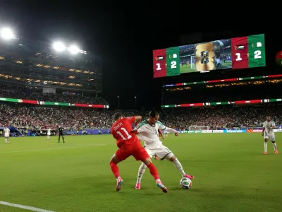 Soccer Football - FIFA World Cup 2026 - Group J - Jordan v Algeria - San Francisco Bay Area Stadium, Santa Clara, California, U.S. - June 22, 2026 Algeria's Anis Hadj Moussa in action with Jordan's Odeh Fakhoury IMAGN IMAGES via Reuters/David Gonzales