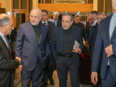 Minister of Foreign Affairs of Iran, Seyyed Abbas Araghchi, centre, and Speaker of the Islamic Parliament of Iran, Mohammad Bagher Ghalibaf, left, at the Buergenstock resort in Obbuergen, near Lucerne, Switzerland, Sunday, June 20, 2026.  URS FLUEELER/Pool via REUTERS
