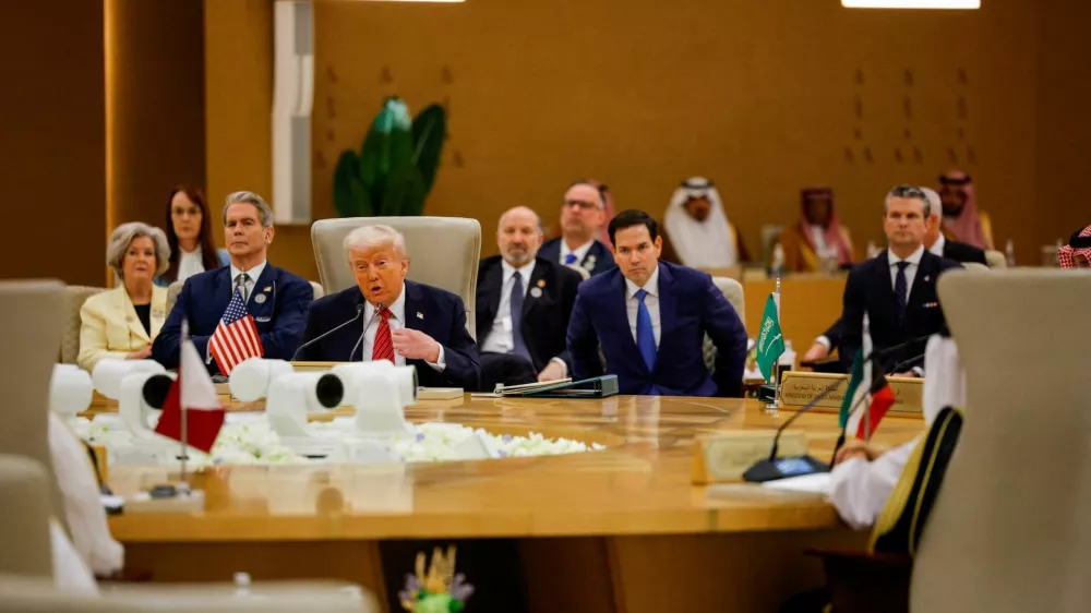 FILE PHOTO: U.S. President Donald Trump speaks at the Gulf Cooperation Council (GCC), in front of U.S. Secretary of State Marco Rubio and Defense Secretary Pete Hegseth, in Riyadh, Saudi Arabia, May 14, 2025. REUTERS/Brian Snyder/File Photo