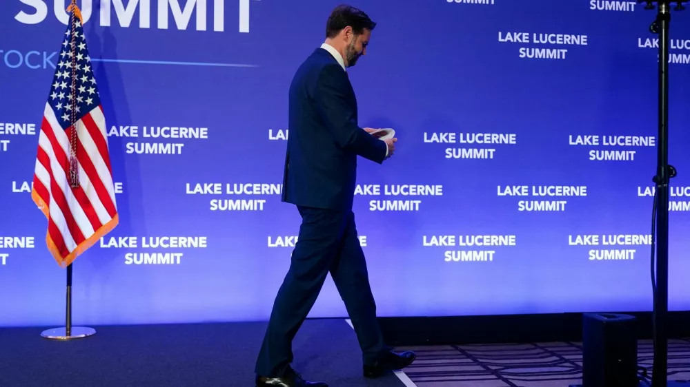 U.S. Vice President JD Vance walks after speaking to members of the media at the Buergenstock Resort Lake Lucerne, after the U.S. and Iran held high-level talks at the Lake Lucerne Summit, near Stansstad, Switzerland, June 22, 2026. REUTERS/Nathan Howard/Pool REFILE - QUALITY REPEAT