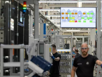 FILE PHOTO: Worker assemble axial-flux motors for electric vehicles on an assembly line at the Mercedes-Benz engine factory in Berlin, Germany June 9, 2026. REUTERS/Axel Schmidt/File Photo