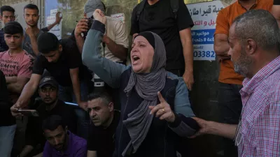 Mourners react during the funeral of Palestinian Raghad Hassan Ashour, 16, after she was killed in an Israeli airstrike, at Al-Shifa Hospital, Gaza City, Monday, June 22, 2026. (AP Photo/Jehad Alshrafi)