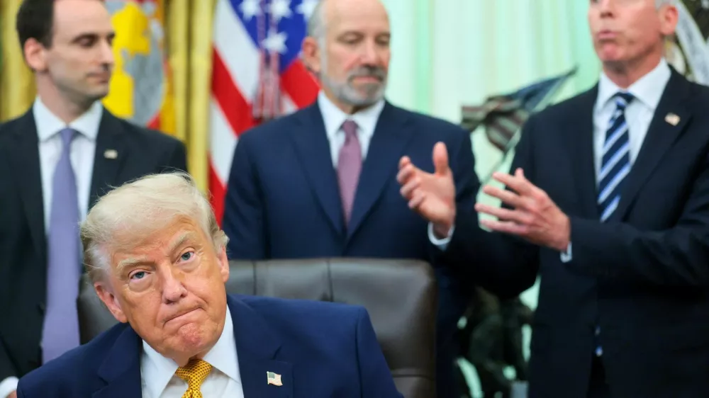 U.S. President Donald Trump, with White House Office of Science and Technology Policy Director Michael Kratsios, Secretary of Commerce Howard Lutnick and Secretary of Energy Chris Wright, attend a signing of two executive orders regarding quantum computing, in the Oval Office at the White House in Washington, D.C., U.S., June 22, 2026. REUTERS/Jonathan Ernst