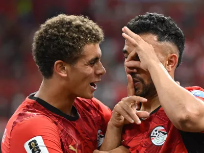 Soccer Football - FIFA World Cup 2026 - Group G - New Zealand v Egypt - BC Place, Vancouver, Canada - June 21, 2026 Egypt's Mahmoud Trezeguet celebrates scoring their third goal with Hamza Abdelkarim IMAGN IMAGES via Reuters/Anne-Marie Sorvin