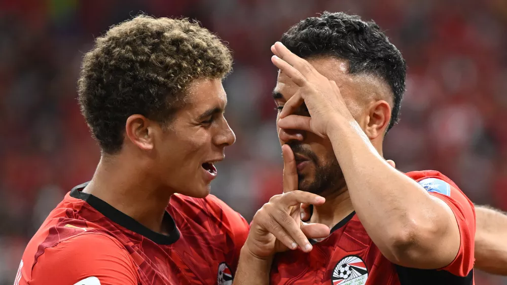 Soccer Football - FIFA World Cup 2026 - Group G - New Zealand v Egypt - BC Place, Vancouver, Canada - June 21, 2026 Egypt's Mahmoud Trezeguet celebrates scoring their third goal with Hamza Abdelkarim IMAGN IMAGES via Reuters/Anne-Marie Sorvin