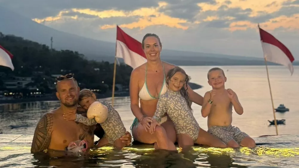 Story from Jam Press (No Doors Villa)Pictured: Lucy with her family.VIDEO: 'We had a cushty life in the UK but left FOREVER to raise our kids in Bali &ndash; our house has no windows or doors but it's paradise'A family has left the UK for good to raise their children in Bali &ndash; where they live in a home with no windows or doors.Lucy Argent had a "nice life" in the UK, with a "beautiful" home, good careers and no financial woes.But the 41-year-old and husband Paul, 36, felt stuck in the same routine, and wanted more for their three children &ndash; seven-year-old Amaya, six-year-old Roo and four-year-old Lela.They decided to convert their Cambridgeshire home into an Airbnb to rent out, generating income for them, while they fled to the Indonesian island for a complete lifestyle overhaul.Now, they say life is so sweet that they can't seem themselves ever returning to their home country &ndash; even if it means sacrificing&hellip;walls."We won't ever live in the UK again," Lucy, who owned beauty salons prior to the move, while Paul worked as a builder, told creatorzine.com."We had a nice life in the UK &ndash; a beautiful house, great careers, we made good money and had achieved everything."But we felt like we weren't living."I had my third baby and thought 'How can this be my life for the next 30 years?'"There had to be more to life than just surviving."Now, we are outside all the time, the TV is barely on and we're a lot more active because of the weather."It's a fraction of the cost to live here, and we don't have to work a 9-5."The children are thriving in this environment."Lucy, who moved to Bali two years ago, has been documenting their new lives on TikTok, where she has amassed over 100,000 followers.A recent post went viral with over half a million views, where she gave an insight into their unusual home, which is largely open to the outdoors.She said: "The villa that we live in has no windows or doors."They're kind of overrated here, really."We have these little roller blinds that come down, so when it rains heavily the inside is protected from the elements."But we've gotten used to having no windows or doors."Outside, they have a swimming pool and garden, with the villa wrapping around the space.Much of it has no windows or doors &ndash; with their living room almost totally outside, overlooking the pool.Lucy added: "It's very nice &ndash; it's a social villa and we love that it's all open plan."Despite being largely open, the home has air conditioning and fans to keep things cool, and they use incense to keep the mosquitos at bay.Meanwhile their bedroom has a tall, traditional ceiling with Lucy jokes is likely home to "a few animals", and their bathroom is outdoors, too &ndash; though still private.Lucy said: "It was very, very strange for us when we first arrived in Bali."But we've lived here for over a year now, and this is pretty normal."And when we move on &ndash; if we are ever lucky enough to build our own villa &ndash; we would design it like this, with the outdoor space and open-plan, open living, no windows and doors situation."We thought we would want something modern and aesthetic, but since living here we would absolutely more go down the traditional route &ndash; it's so perfect for families."ENDSEDITOR'S NOTE: Non-Exclusive Licence: A non-exclusive licence has been obtained directly from the verified copyright holder. The copyright holder retains the ability to license the content elsewhere.,Image: 1110278501, License: Rights-managed, Restrictions: EDITOR'S NOTE: Non-Exclusive Licence: A non-exclusive licence has been obtained directly from the verified copyright holder. The copyright holder retains the ability to license the content elsewhere., Model Release: no 