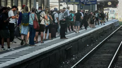 Passengers wait for a train at a platform in the central train station in Frankfurt, Germany, Wednesday, June 24, 2026, following the nationwide service disruption on the Deutsche Bahn network. (AP Photo/Michael Probst)