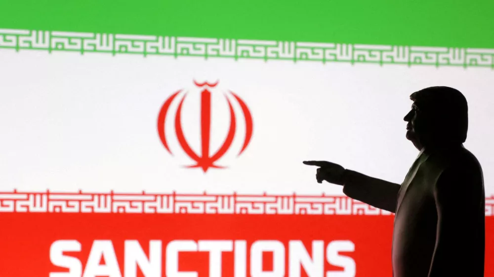 FILE PHOTO: A 3D-printed miniature model depicting U.S. President Donald Trump, Iran flag and word "Sanctions" in this illustration created on April 17, 2025. REUTERS/Dado Ruvic/Illustration//File Photo