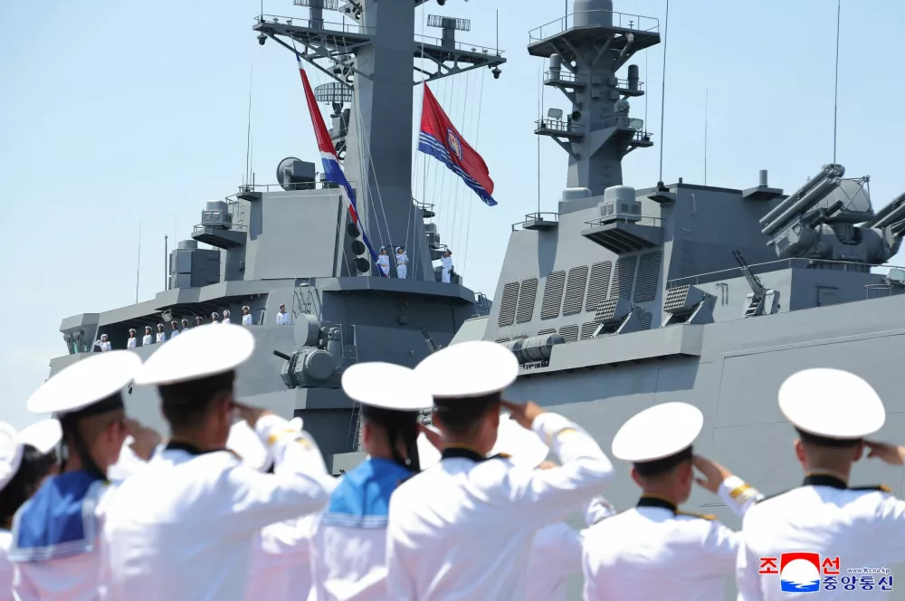 Sailors salute during the commissioning ceremony of the new multipurpose destroyer Choe Hyon at Nampho port, North Korea, June 23, 2026, in this picture released by North Korea's official Korean Central News Agency.  KCNA via REUTERS  ATTENTION EDITORS - THIS IMAGE WAS PROVIDED BY A THIRD PARTY. REUTERS IS UNABLE TO INDEPENDENTLY VERIFY THIS IMAGE. NO THIRD PARTY SALES. SOUTH KOREA OUT. NO COMMERCIAL OR EDITORIAL SALES IN SOUTH KOREA.