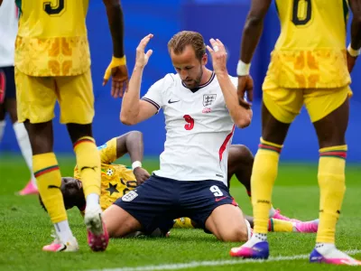 England's Harry Kane (9) reacts after missing a shot on goal during the World Cup Group L soccer match between England and Ghana in Foxborough, Mass., near Boston, Tuesday, June 23, 2026. (AP Photo/Petr David Josek)