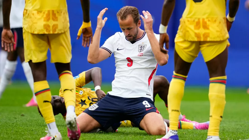 England's Harry Kane (9) reacts after missing a shot on goal during the World Cup Group L soccer match between England and Ghana in Foxborough, Mass., near Boston, Tuesday, June 23, 2026. (AP Photo/Petr David Josek)