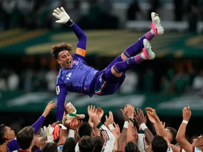 Mexico goalkeeper Guillermo Ochoa (13) is celebrated by his team after the World Cup Group A soccer match between Czechia and Mexico in Mexico City, Wednesday, June 24, 2026. (AP Photo/Natacha Pisarenko)