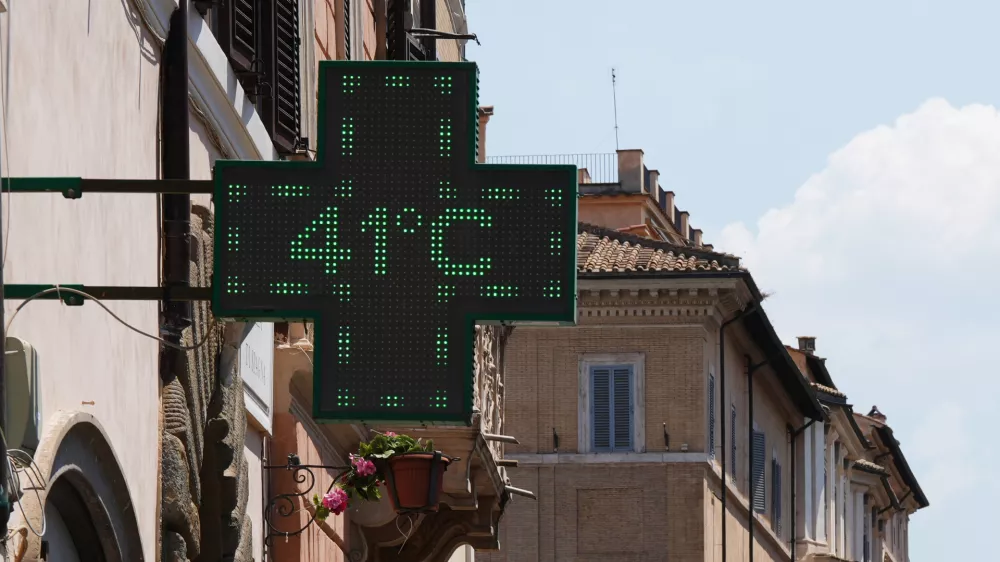 The thermometer of a drugstore shows the temperature of 41 degrees Celsius (105 degrees Fahrenheit) during a heat wave, in Rome, Tuesday, June 23, 2026. (AP Photo/Alessandra Tarantino)