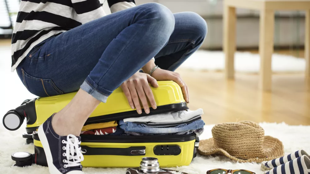 Preparation travel suitcase at home