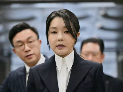 FILE - South Korea's former first lady Kim Keon Hee, wife of impeached former president Yoon Suk Yeol, arrives at a court to attend a hearing to review her arrest warrant requested by special prosecutors, in Seoul, South Korea, on Aug. 12, 2025. (Jung Yeon-je/Pool Photo via AP, File)
