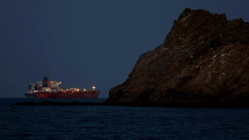 FILE PHOTO: The Callisto tanker sits anchored as the traffic is down in the Strait of Hormuz, amid the U.S.-Israeli conflict with Iran, in Muscat, Oman, March 10, 2026. REUTERS/Benoit Tessier/File Photo