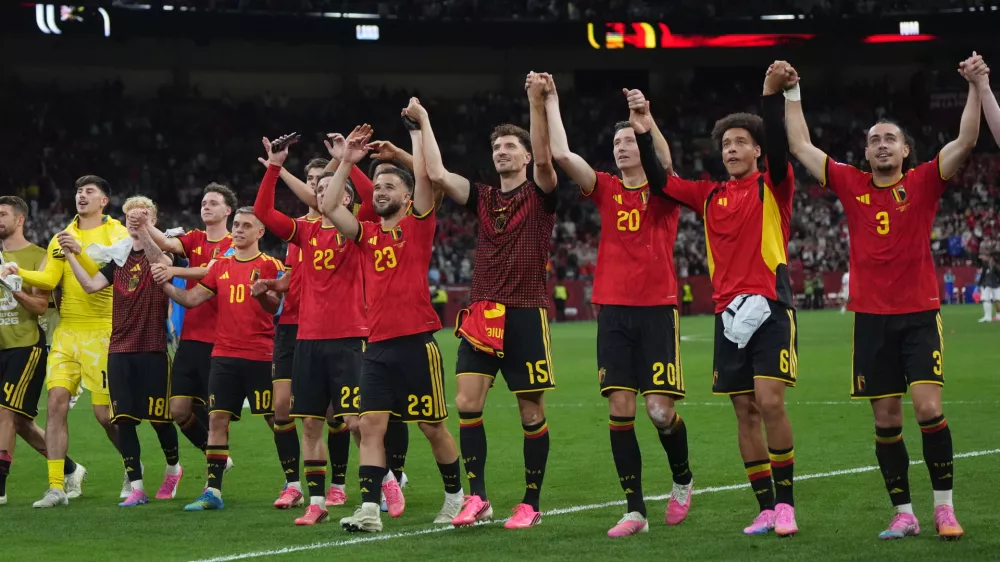 Belgium celebrates the win over New Zealand after their World Cup Group G soccer match in Vancouver, British Columbia, Friday, June 26, 2026. (Darryl Dyck/The Canadian Press via AP)