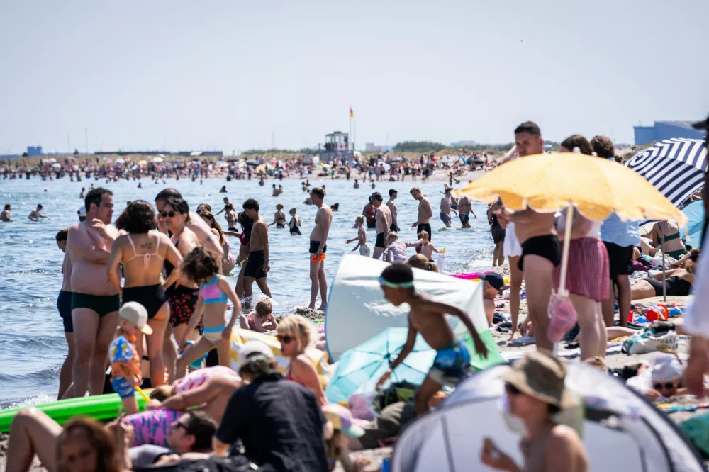 A view of people at Amager Beach, in Copenhagen, Saturday, June 27, 2026. (Emil Nicolai Helms/Ritzau Scanpix via AP)