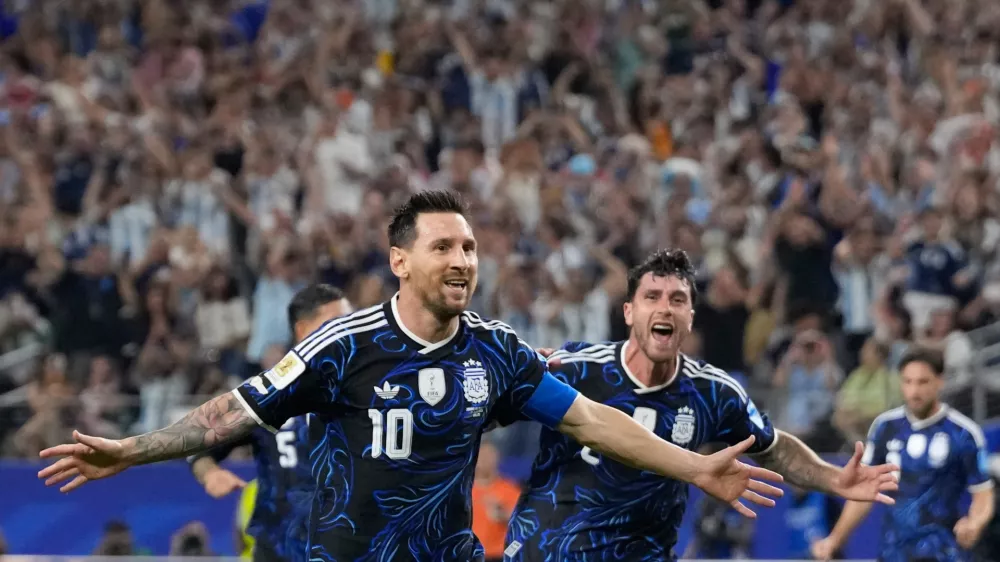 Argentina's Lionel Messi (10) celebrates scoring his side's 3rd goal during the World Cup Group J soccer match between Jordan and Argentina in Arlington, Texas, near Dallas, Saturday, June 27, 2026. (AP Photo/Tony Gutierrez)