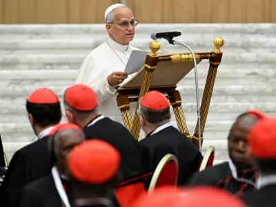 Pope Leo speaks during an extraordinary consistory on the international situation, peace and moving beyond the theory of the "just war", in the Paul VI hall, at the Vatican June 26, 2026.  Vatican Media/Handout via REUTERS  THIS IMAGE HAS BEEN SUPPLIED BY A THIRD PARTY