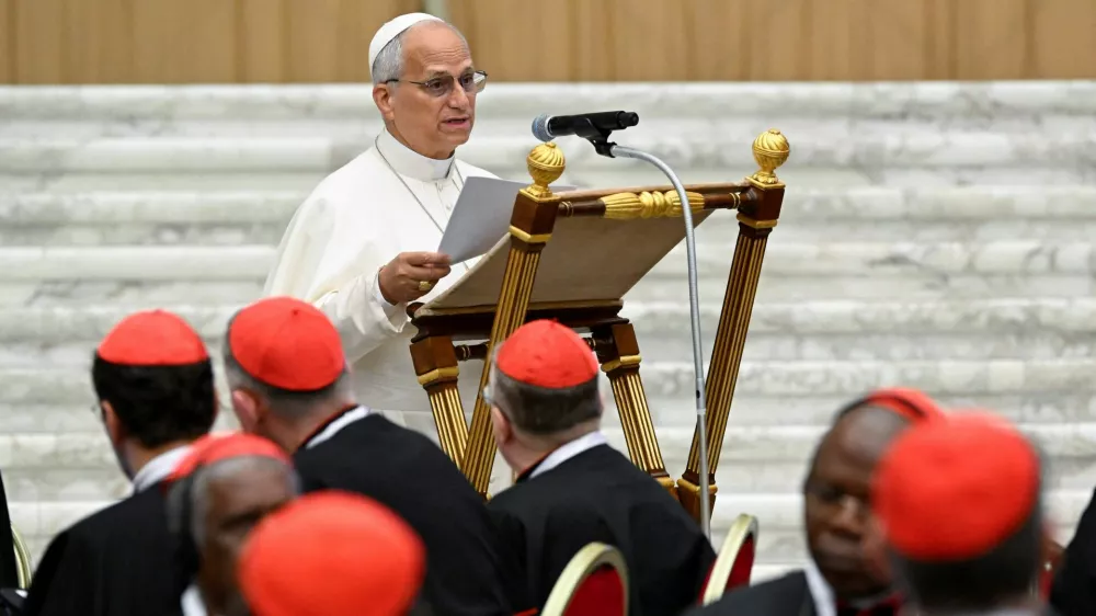 Pope Leo speaks during an extraordinary consistory on the international situation, peace and moving beyond the theory of the "just war", in the Paul VI hall, at the Vatican June 26, 2026.  Vatican Media/Handout via REUTERS  THIS IMAGE HAS BEEN SUPPLIED BY A THIRD PARTY