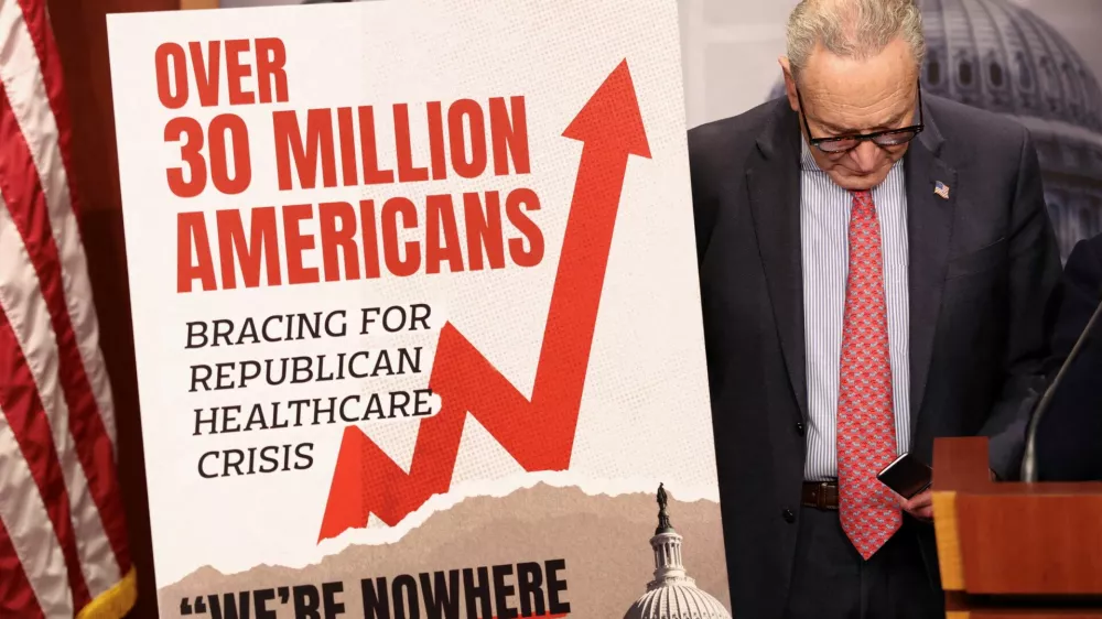 U.S. Senate Democratic Leader Chuck Schumer looks down during a news conference following Senate votes on competing healthcare plans, at the U.S. Capitol in Washington, D.C., U.S., December 11, 2025. REUTERS/Kevin Lamarque