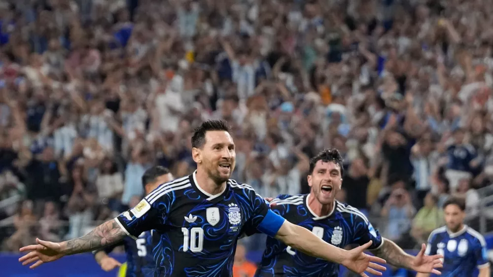 Argentina's Lionel Messi (10) celebrates scoring his side's 3rd goal during the World Cup Group J soccer match between Jordan and Argentina in Arlington, Texas, near Dallas, Saturday, June 27, 2026. (AP Photo/Tony Gutierrez)