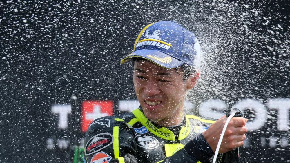 Japan's rider Ai Ogura of the Trackhouse MotoGP Team celebrates after winning the MotoGP race at the Grand Prix of the Netherlands in Assen, northern Netherlands, Sunday, June 28, 2026. (AP Photo/Patrick Post)