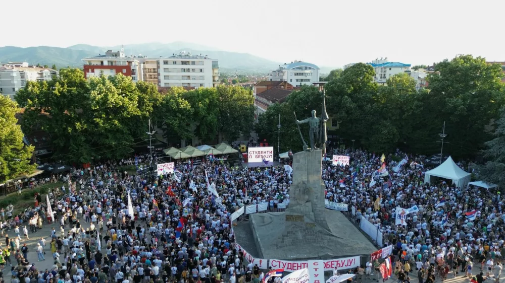 A drone picture shows people gathering for a protest, as part of a nationwide anti-government movement triggered by the deadly collapse of the Novi Sad railway station canopy in November 2024, following Serbian President Aleksandar Vucic's resignation announcement, in Kraljevo, Serbia, June 28, 2026. REUTERS/Djordje Kojadinovic