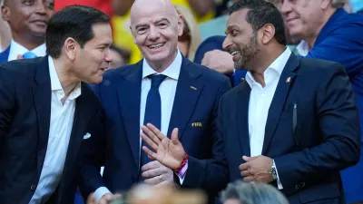 FIFA President Gianni Infantino, centre, stands with and United States Secretary of State Marco Rubio, left, and Director of the FBI, Kash Patel react ahead of the World Cup Group K soccer match between Colombia and Portugal in Miami Gardens, Fla., Saturday, June 27, 2026. (AP Photo/Rebecca Blackwell)