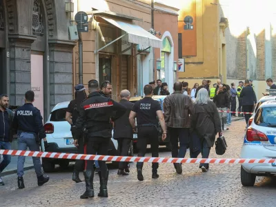 Police officers work at the scene after several people were injured when a car drove into pedestrians in the center of the northern Italian city of Modena, Italy, May 16, 2026. REUTERS/Stringer