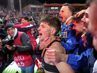 Bosnia's Esmir Bajraktarevic celebrates after winning a penalty shootout during the World Cup qualifying playoff final soccer match between Bosnia and Italy in Zenica, Bosnia, Tuesday, March 31, 2026. (AP Photo/Armin Durgut)