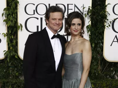 Colin Firth arrives with his wife Livia Giuggioli for the Golden Globe Awards Sunday, Jan. 16, 2011, in Beverly Hills, Calif. (AP Photo/Matt Sayles)