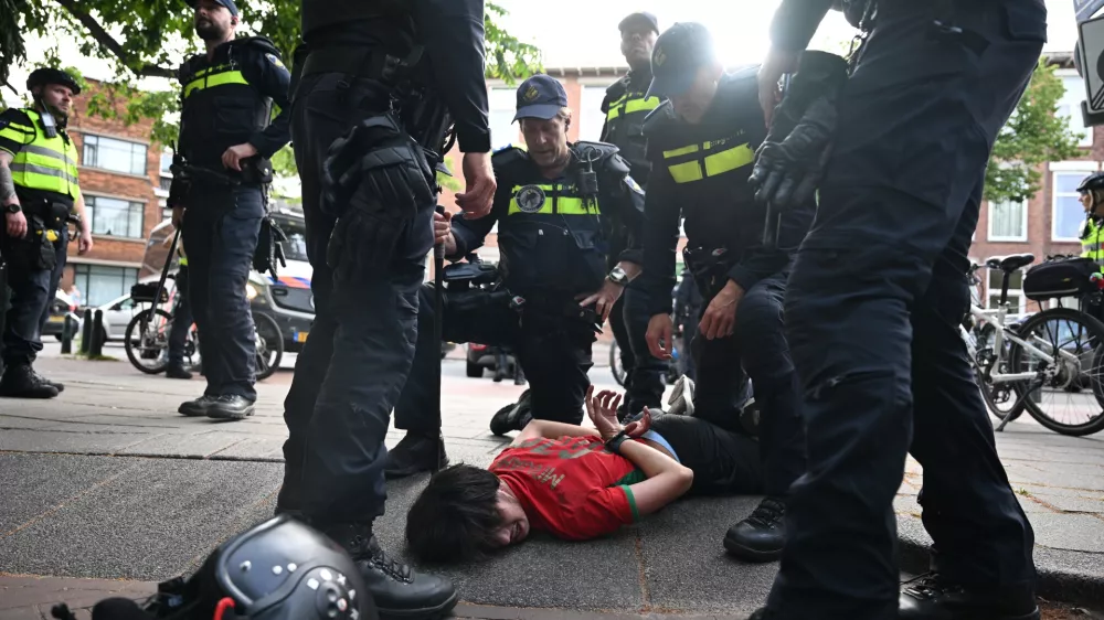 Moroccan fan celebrates after a World Cup soccer match between the Netherlands and Morocco in The Hague, Netherlands, Tuesday, June30, 2026. (AP Photo/Mouneb Taim)