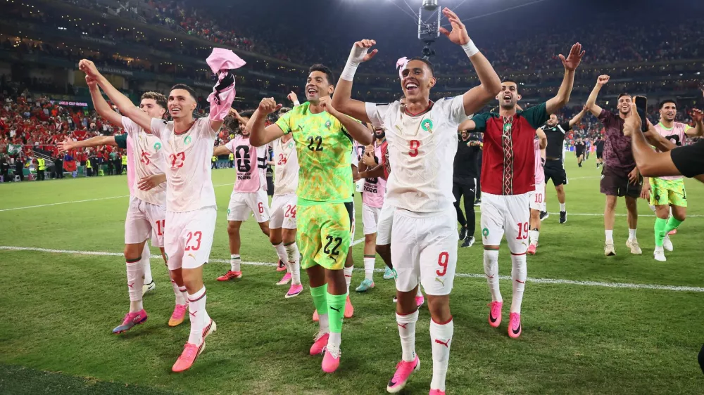 Soccer Football - FIFA World Cup 2026 - Round of 32 - Netherlands v Morocco - Estadio Monterrey, Monterrey, Mexico - June 29, 2026 Morocco's Soufiane Rahimi, Ahmed Reda Tagnaouti and teammates celebrate after the match as Morocco qualify for the Round of 16 stage of the World Cup REUTERS/Eloisa Sanchez