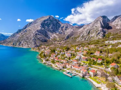 Scenic Boka Kotorska bay village of Donji Orahovac aerial view, archipelago of Montenegro