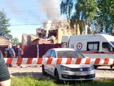 An ambulance stands near a damaged private house following a Ukrainian drone attack, according to regional authorities, in the course of the Russia-Ukraine conflict, in the town of Yegoryevsk, Moscow region, Russia, in this handout image released on June 30, 2026. Governor of Moscow region Andrei Vorobyov/Handout via REUTERS ATTENTION EDITORS - THIS IMAGE WAS PROVIDED BY A THIRD PARTY. NO RESALES. NO ARCHIVES. MANDATORY CREDIT.
