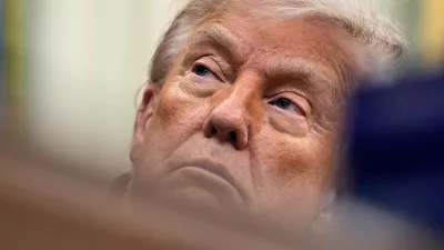 FILE PHOTO: U.S. President Donald Trump looks on as he sits in the Oval Office of the White House in Washington, D.C., U.S., June 26, 2026. REUTERS/Ken Cedeno/File Photo