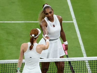 Tennis - Wimbledon - All England Lawn Tennis and Croquet Club, London, Britain - June 30, 2026 Australia's Maya Joint shakes hands with Serena Williams of the U.S. after winning her first round match REUTERS/Toby Melville   TPX IMAGES OF THE DAY