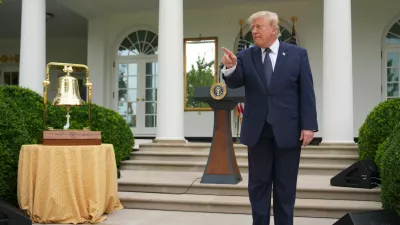 President Donald Trump speaks alongside the New York Stock Exchange bell in the White House Rose Garden, Monday, July 6, 2026, in Washington. (AP Photo/Julia Demaree Nikhinson)