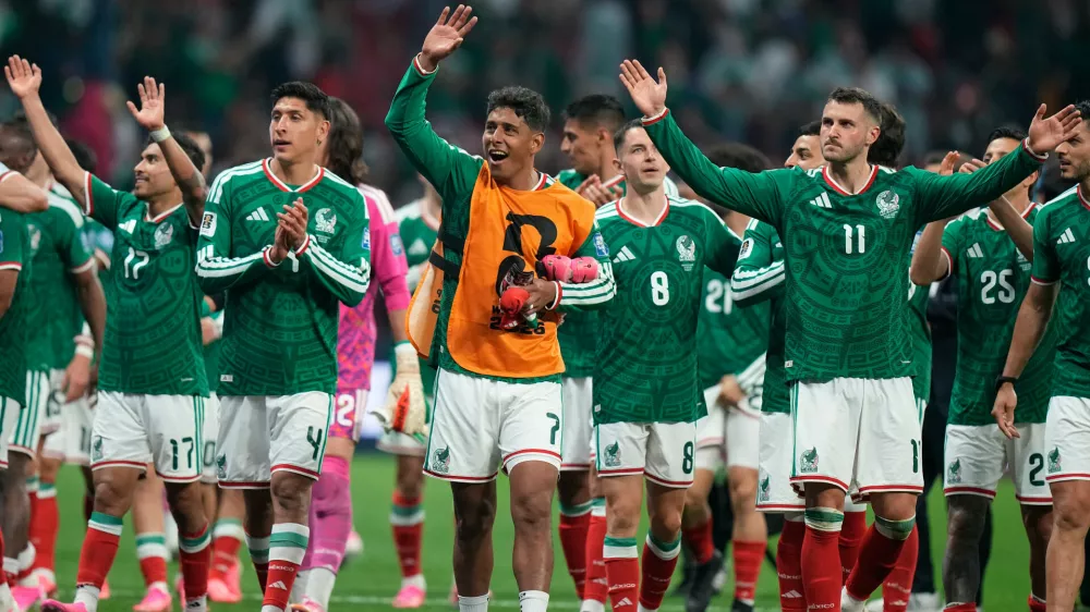 Mexico players celebrate after the World Cup round of 32 soccer match between Mexico and Ecuador in Mexico City, Tuesday, June 30, 2026. (AP Photo/Fernando Llano)