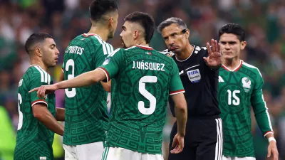 Soccer Football - FIFA World Cup 2026 - Round of 32 - Mexico v Ecuador - Estadio Azteca, Mexico City, Mexico - June 30, 2026 Referee Slavko Vincic gestures to Mexico's Cesar Montes REUTERS/Raquel Cunha