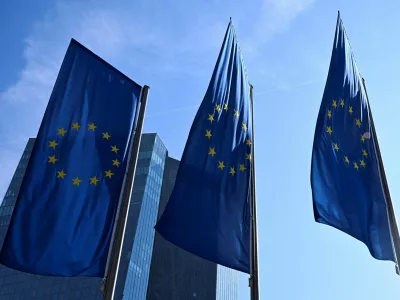 FILE PHOTO: European Union flags flutter outside the European Central Bank (ECB) headquarters in Frankfurt, Germany, March 19, 2026. REUTERS/Jana Rodenbusch/File Photo